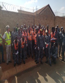 The site crew in orange vests