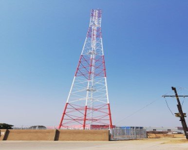 Lattice telecom tower on one of the company's sites